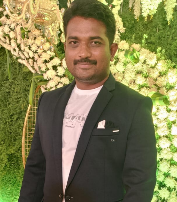 Mr. U. Sreenivasulu, Principal of Sri Sai Balaji EM School - Professional portrait